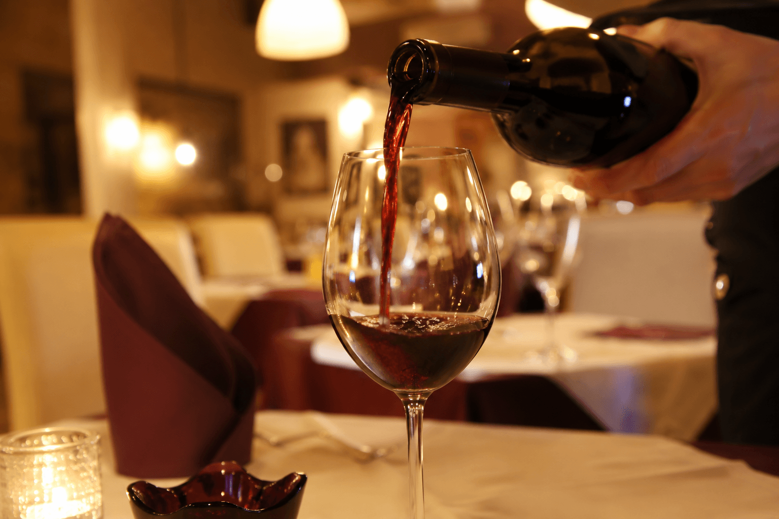 Red wine being served at Sorrento di Italia